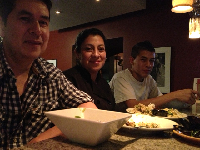 The Alvarado-Saavedras enjoying dinner together at the end of a Sunday evening shift.